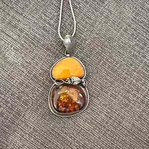 Elegant Silver and Amber Pendant Necklace